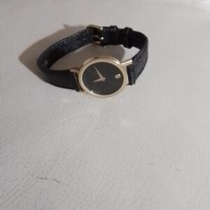 Elegant Gold and Black Watch